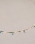08.25.860 18kt Gold Necklace with Swiss Blue Topaz