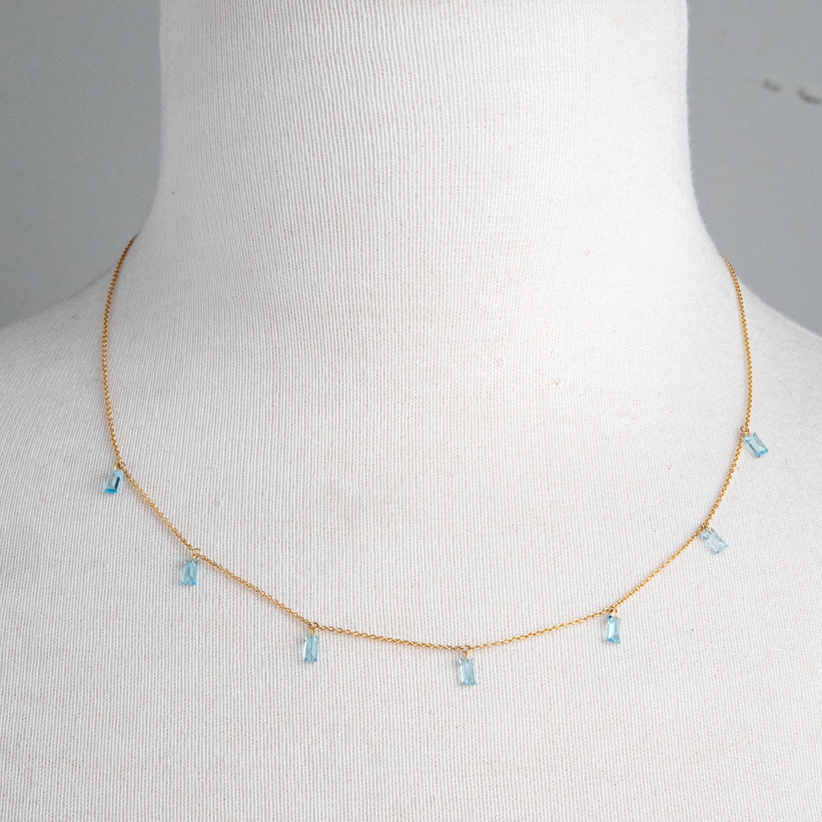 08.25.860 18kt Gold Necklace w Swiss Blue Topaz